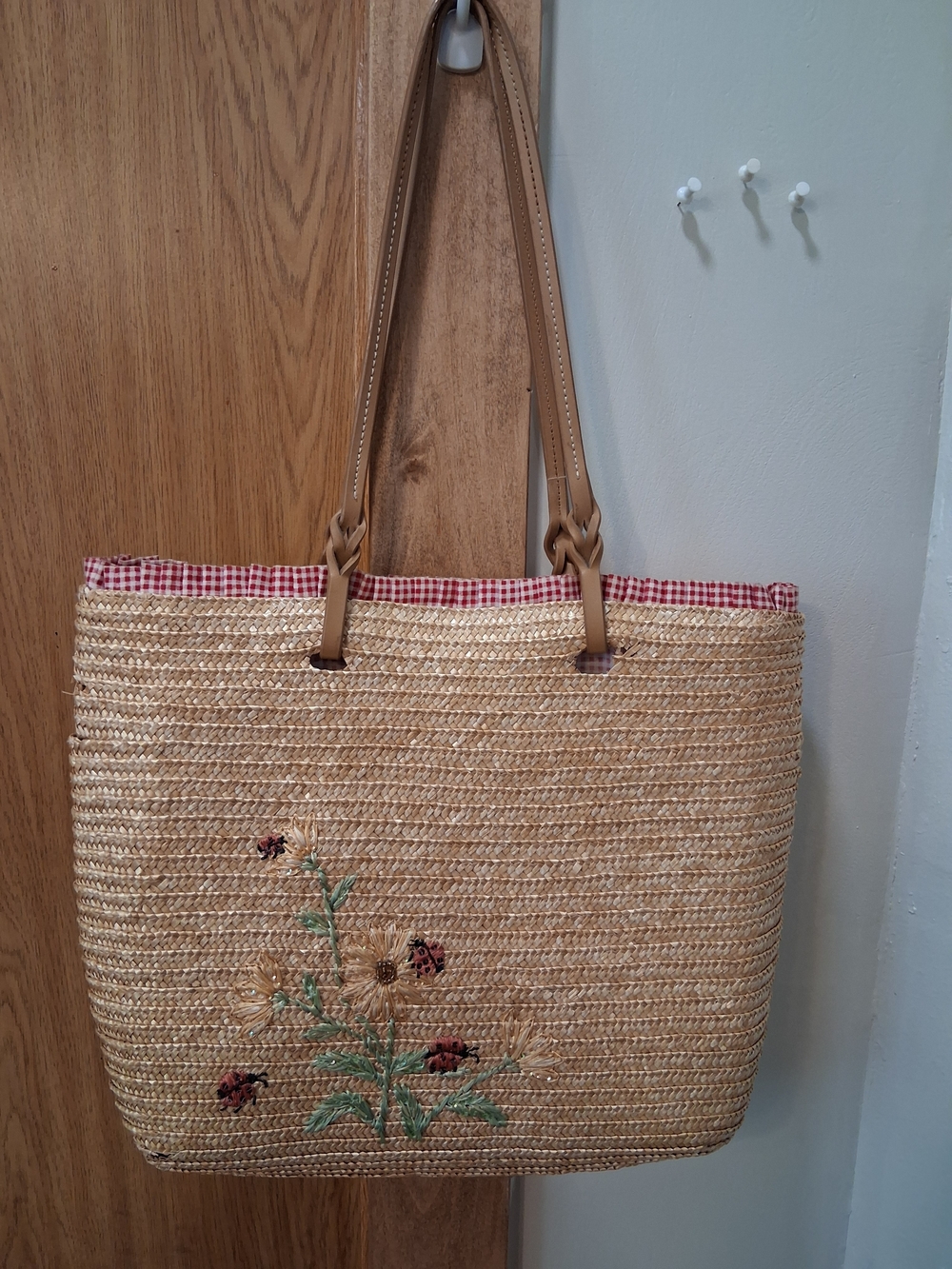 Capelli of New York Straw Tote with Floral Embroidery and Tan Straps